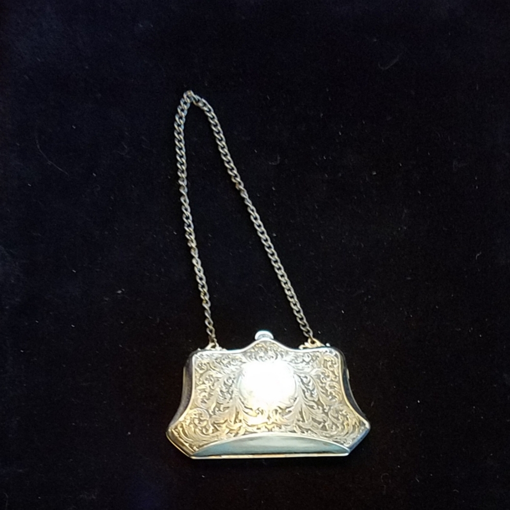 Antique silver purslet